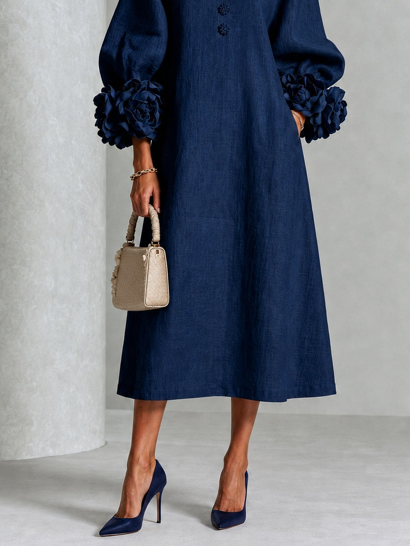 Rame | Vestido midi con botones y llamativos puños florales
